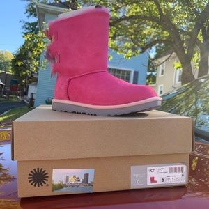 Brand new ugg boots pink with bow tie
